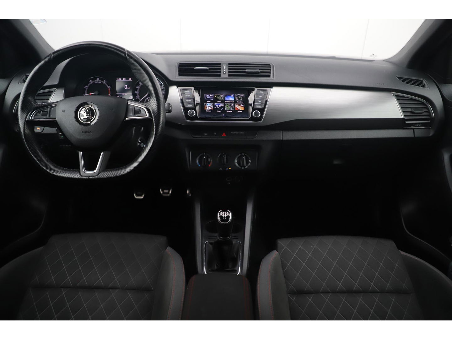 Škoda Fabia Combi 1.0 TSI Sport 95PK RS Stoelen Navigatie Airco Keyless Cruise 16 inch LMV PDC Getint Glas Zwarte Hemel