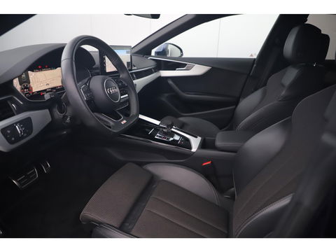 Audi A5 Sportback 35 TDI S-Line edition Automaat Navarra Blue Full LED Wegklapbare Trekhaak Virtual Cockpit Navigatie Achteruitrijcamera Clima Cruise Parkeersensor Half Leder Sportstoelen Draadloos Carplay