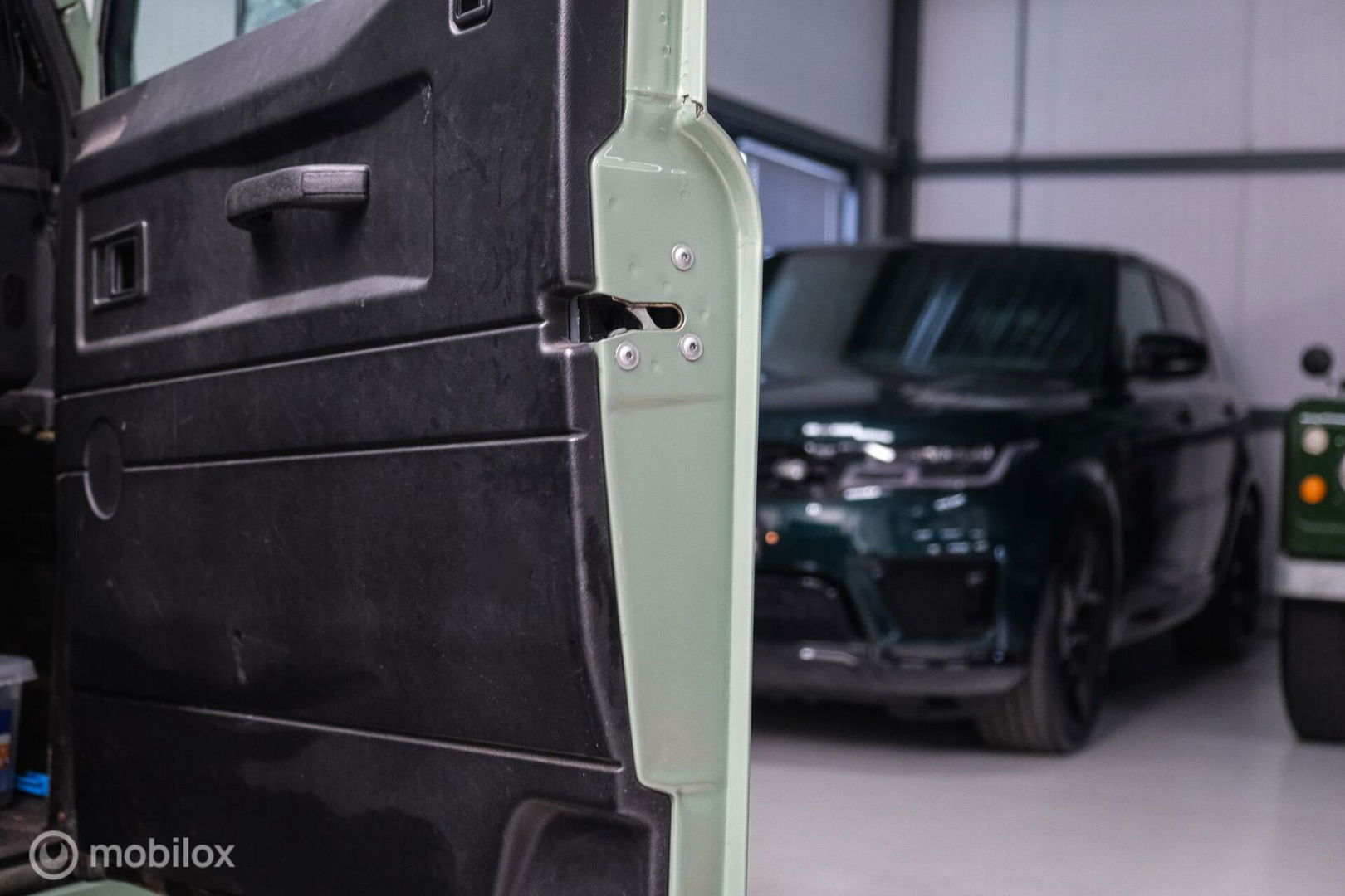 Land Rover Defender 90 2.5 Td5 | HUE 166 | Grasmere Green | Heritage | NL auto NAP | 2e eigenaar | A-Z onderhouden | Unieke auto |