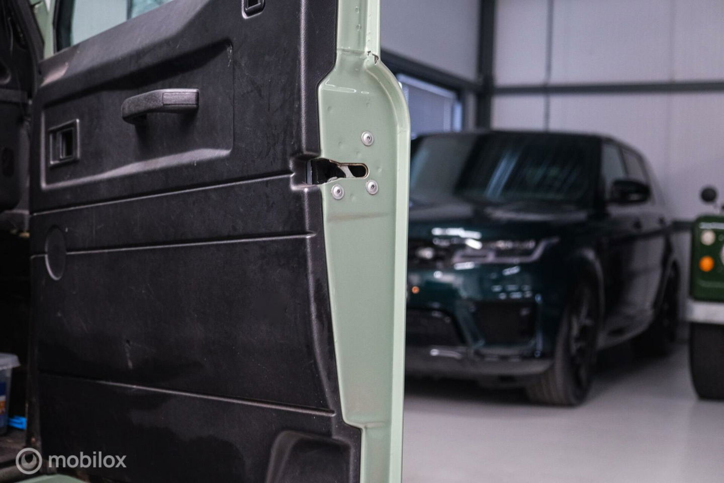 Land Rover Defender 90 2.5 Td5 | HUE 166 | Grasmere Green | Heritage | NL auto NAP | 2e eigenaar | A-Z onderhouden | Unieke auto |