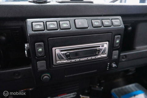 Land Rover Defender 90 2.5 Td5 | HUE 166 | Grasmere Green | Heritage | NL auto NAP | 2e eigenaar | A-Z onderhouden | Unieke auto |