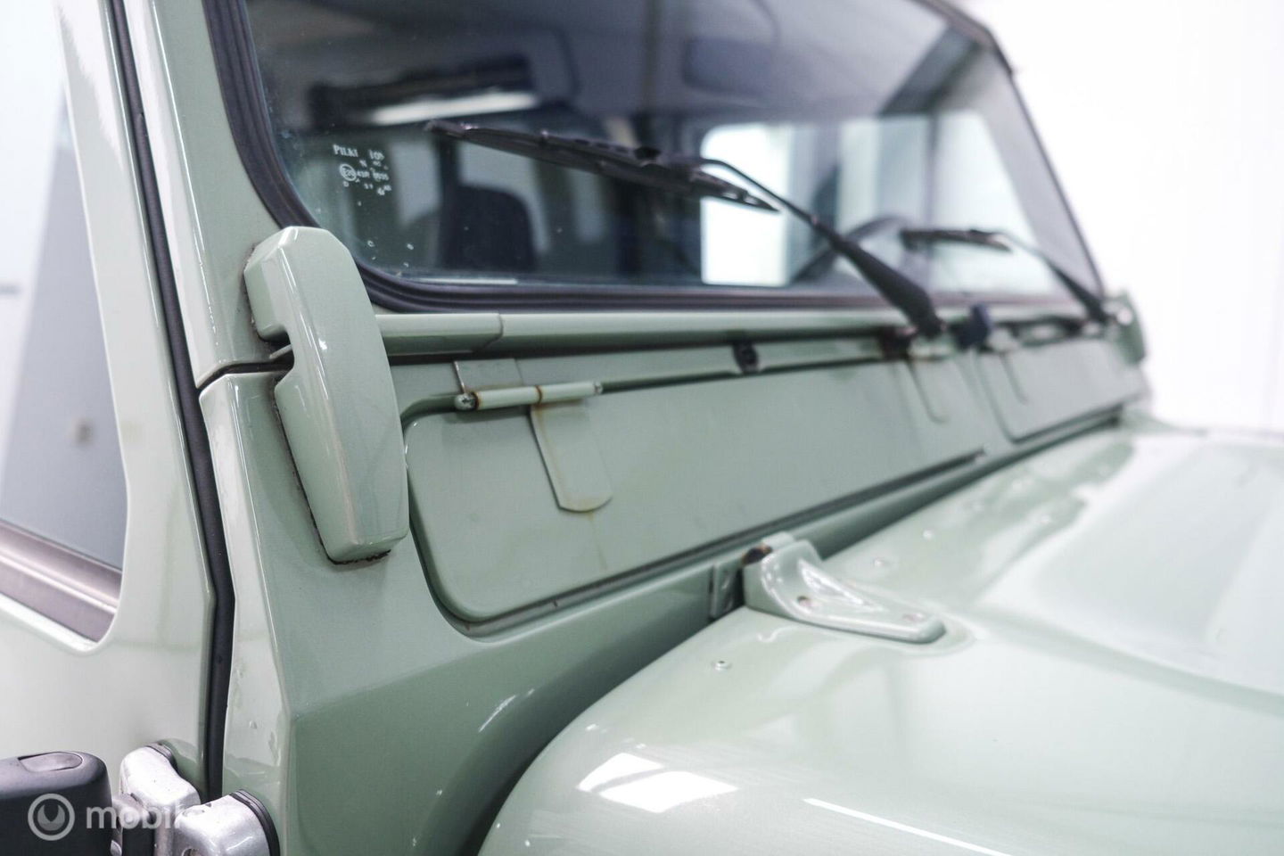 Land Rover Defender 90 2.5 Td5 | HUE 166 | Grasmere Green | Heritage | NL auto NAP | 2e eigenaar | A-Z onderhouden | Unieke auto |