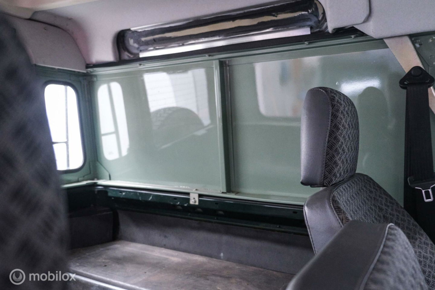 Land Rover Defender 90 2.5 Td5 | HUE 166 | Grasmere Green | Heritage | NL auto NAP | 2e eigenaar | A-Z onderhouden | Unieke auto |