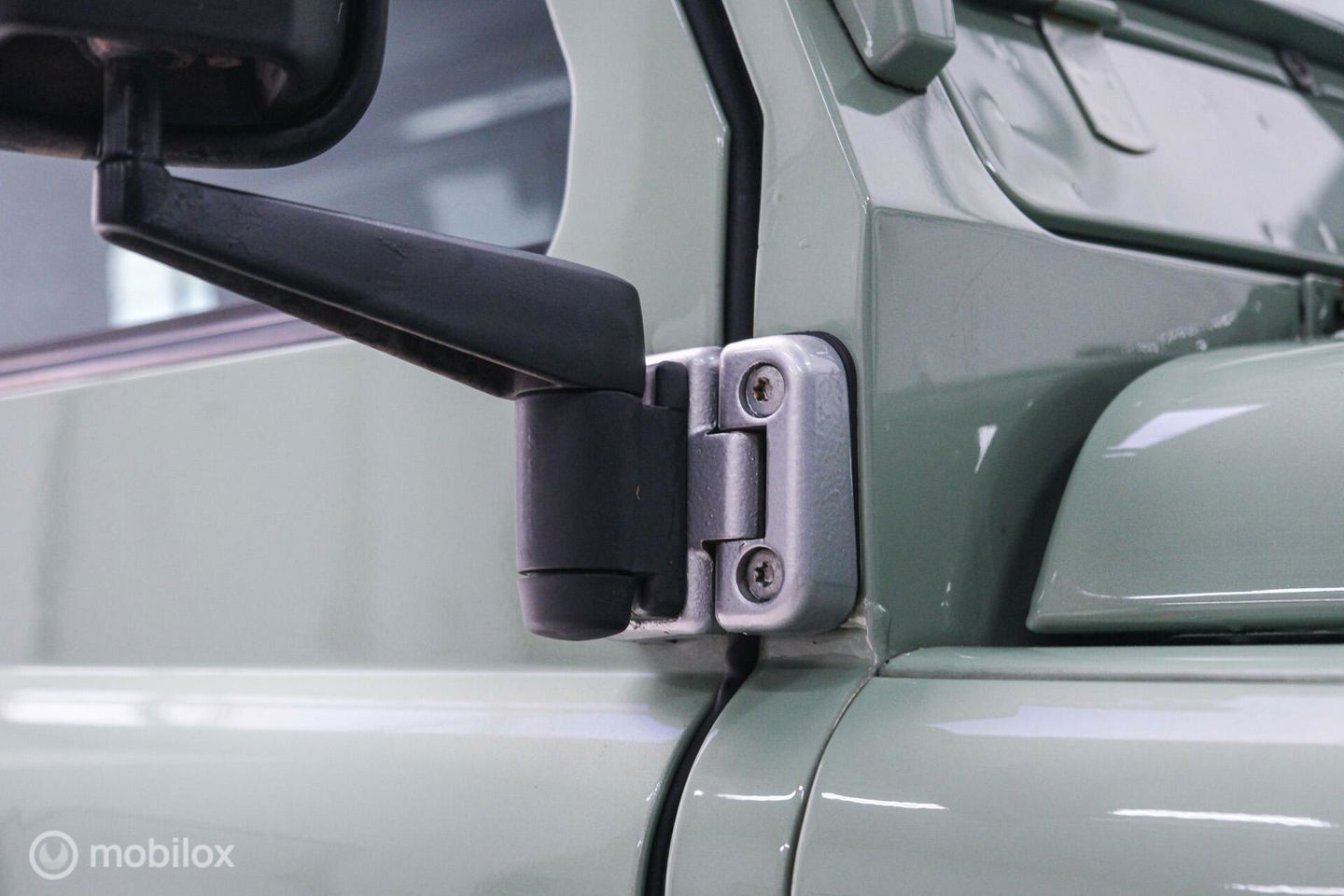 Land Rover Defender 90 2.5 Td5 | HUE 166 | Grasmere Green | Heritage | NL auto NAP | 2e eigenaar | A-Z onderhouden | Unieke auto |