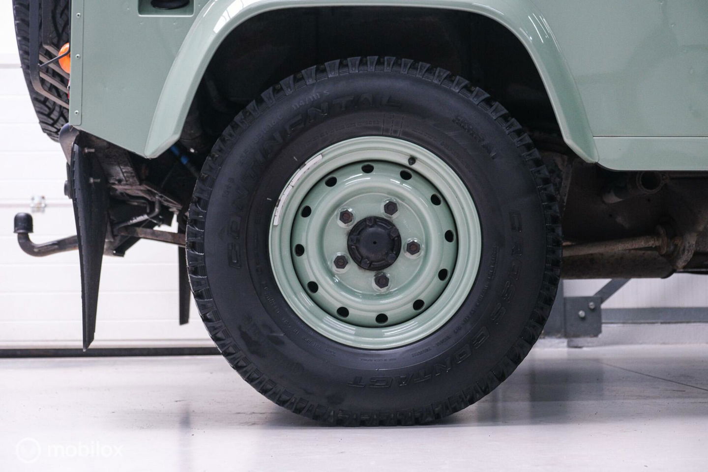 Land Rover Defender 90 2.5 Td5 | HUE 166 | Grasmere Green | Heritage | NL auto NAP | 2e eigenaar | A-Z onderhouden | Unieke auto |