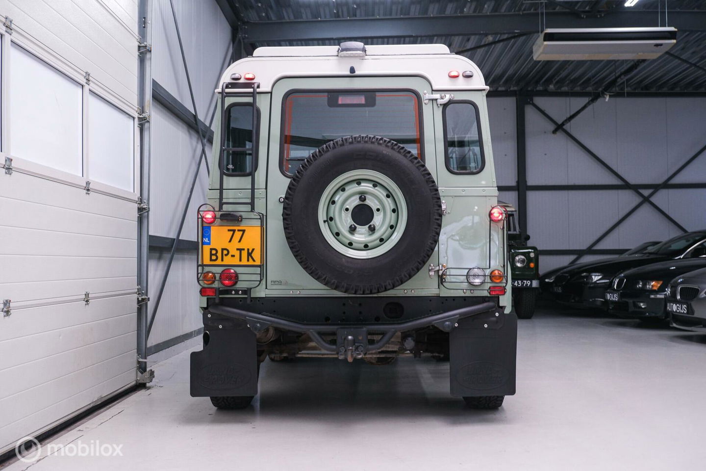Land Rover Defender 90 2.5 Td5 | HUE 166 | Grasmere Green | Heritage | NL auto NAP | 2e eigenaar | A-Z onderhouden | Unieke auto |