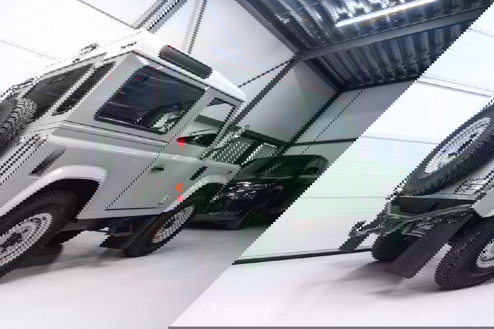Land Rover Defender 90 2.5 Td5 | HUE 166 | Grasmere Green | Heritage | NL auto NAP | 2e eigenaar | A-Z onderhouden | Unieke auto |