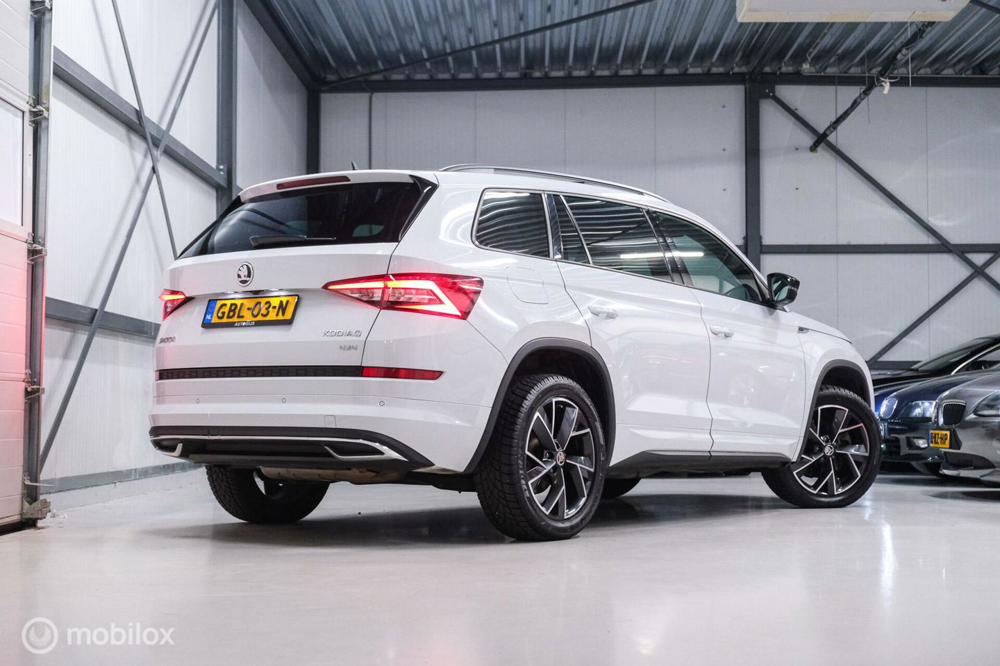 Škoda Kodiaq 2.0 TSI 4x4 Sportline Business 7p. | Panorama | LED | Adaptive | DAB+ | CarPlay | Memory | Keyless |