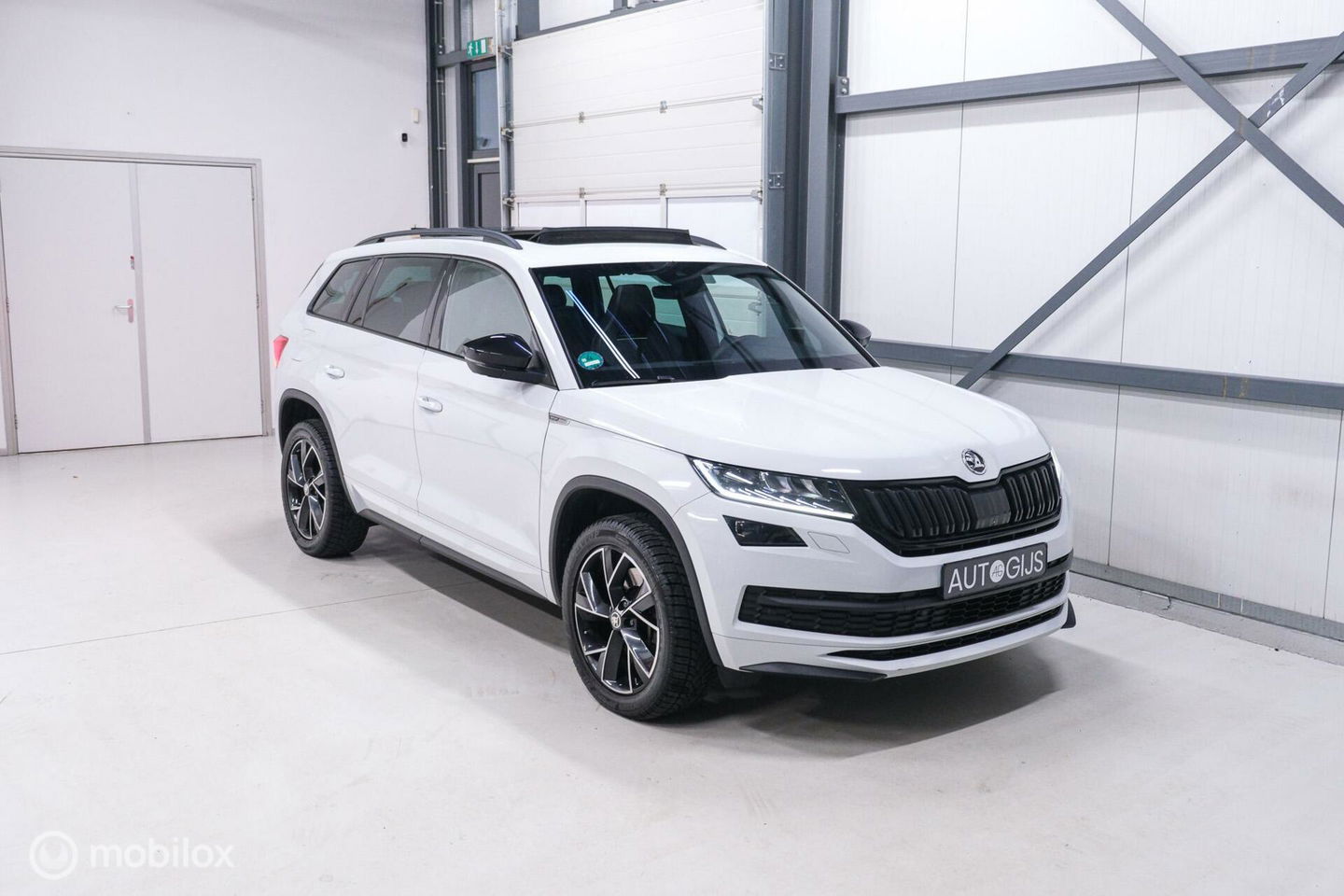 Škoda Kodiaq 2.0 TSI 4x4 Sportline Business 7p. | Panorama | LED | Adaptive | DAB+ | CarPlay | Memory | Keyless |
