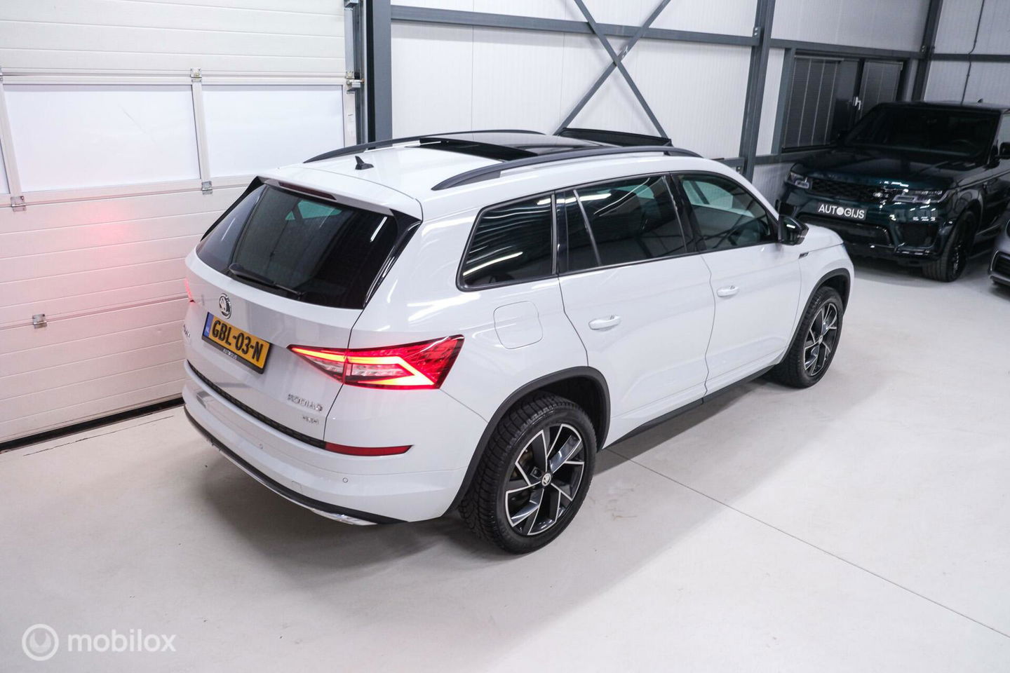 Škoda Kodiaq 2.0 TSI 4x4 Sportline Business 7p. | Panorama | LED | Adaptive | DAB+ | CarPlay | Memory | Keyless |