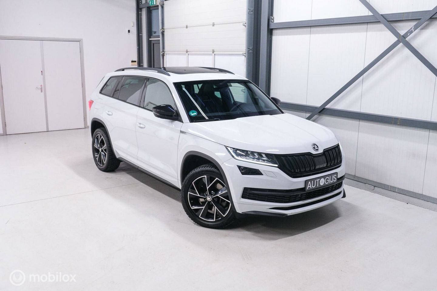 Škoda Kodiaq 2.0 TSI 4x4 Sportline Business 7p. | Panorama | LED | Adaptive | DAB+ | CarPlay | Memory | Keyless |
