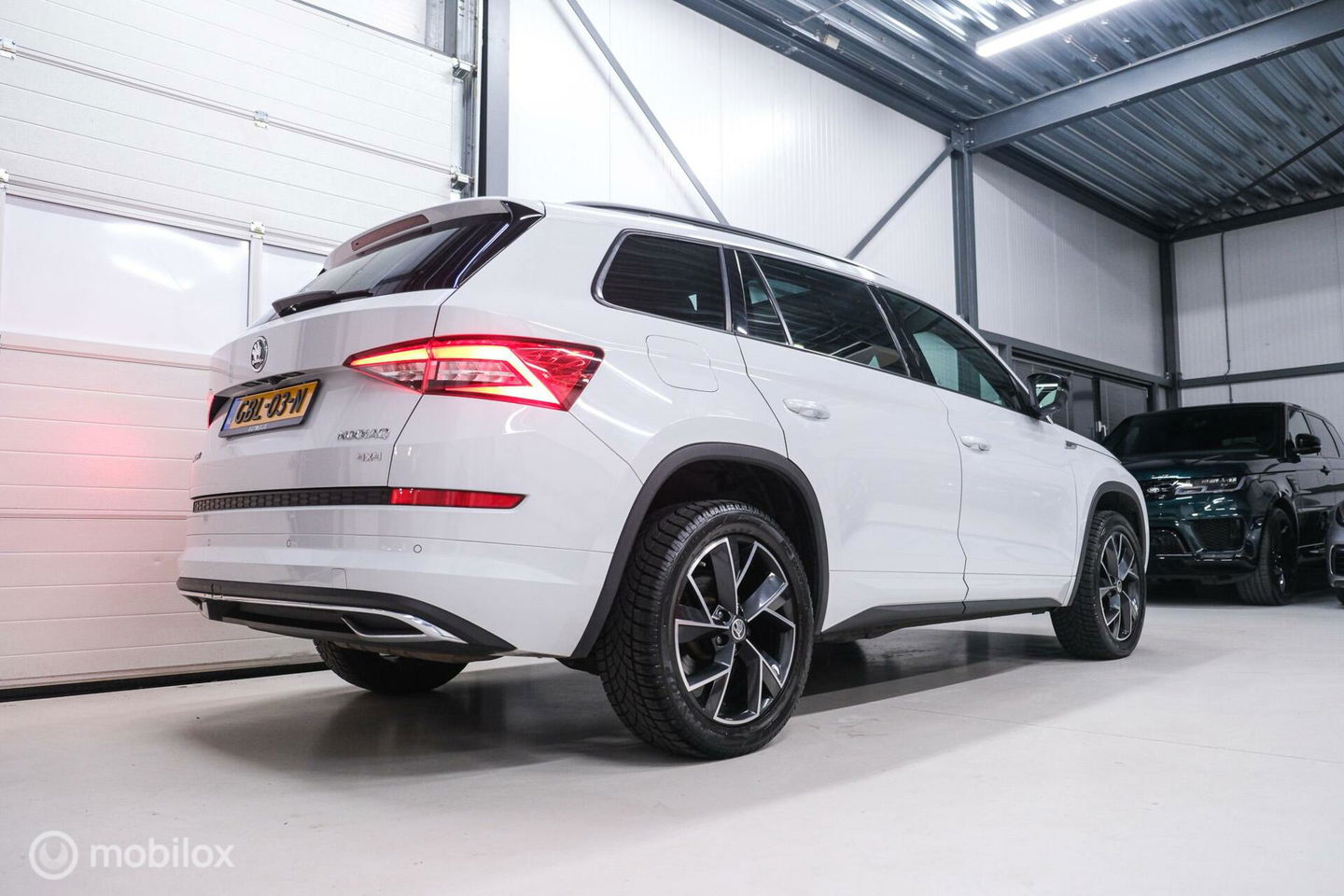 Škoda Kodiaq 2.0 TSI 4x4 Sportline Business 7p. | Panorama | LED | Adaptive | DAB+ | CarPlay | Memory | Keyless |