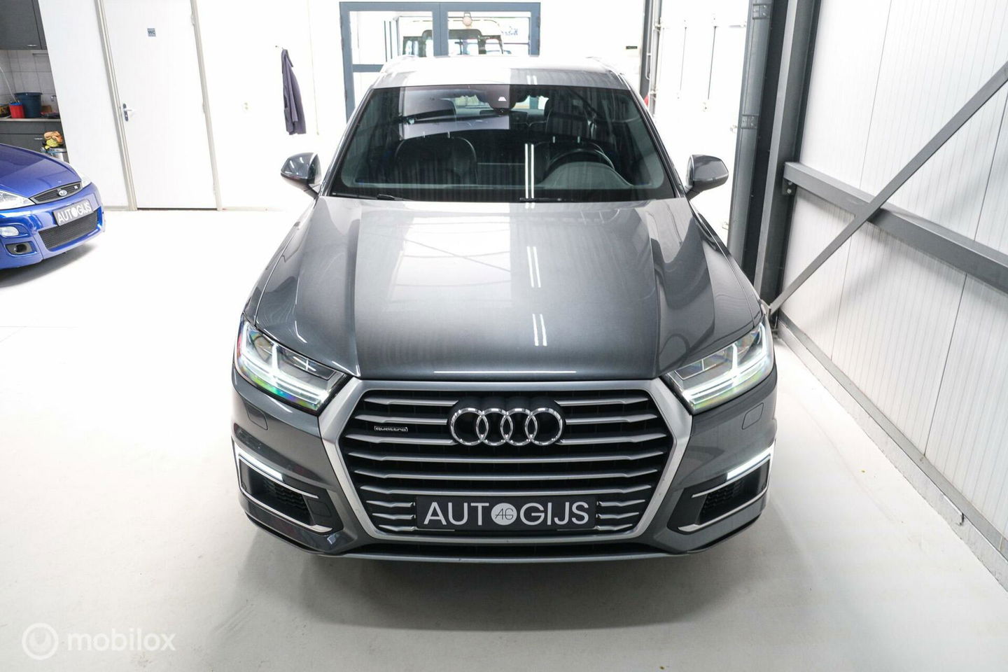 Audi Q7 3.0 TDI e-tron quattro S-Line 373 pk | Luchtvering | Rijklaarprijs | Daytona Grijs | Plug in hybrid | NL auto NAP |