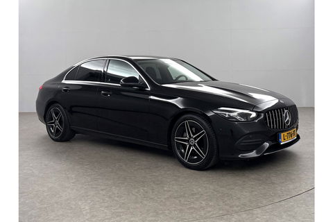Mercedes-Benz C-Klasse 180 AMG Luxury Line 170PK Sfeerverl. Camera Carplay LED Trekhaak Burmester Clima Cruise Navi Virtual 18"LMV PDC
