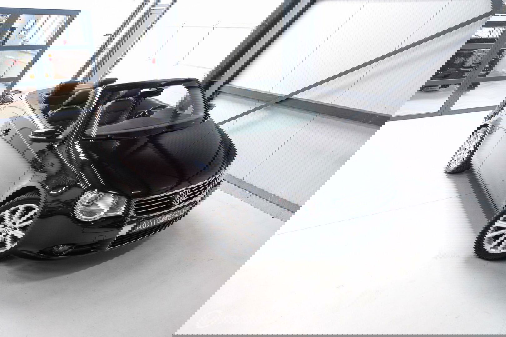 Volkswagen Eos 1.4 TSI Highline | Leder | Glazen schuifdak | Stoelverwarming | Navigatie | PDC | NL auto NAP | Cruise | Clima |