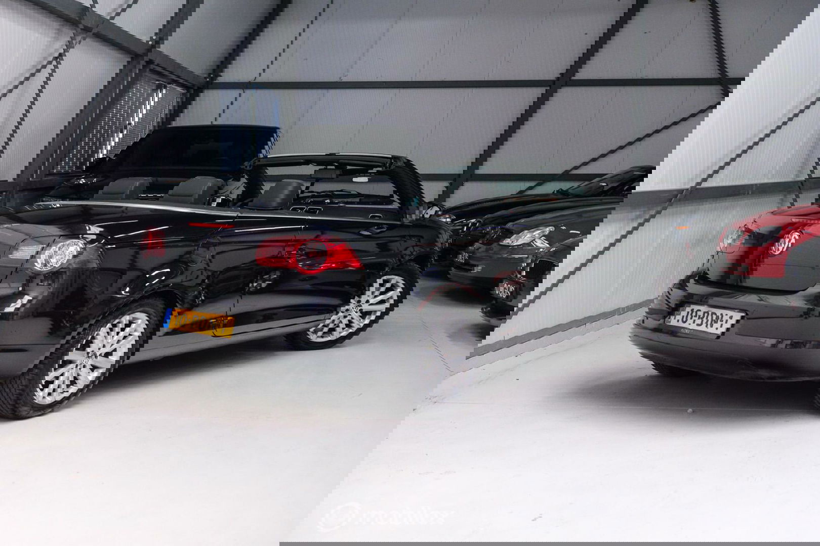 Volkswagen Eos 1.4 TSI Highline | Leder | Glazen schuifdak | Stoelverwarming | Navigatie | PDC | NL auto NAP | Cruise | Clima |