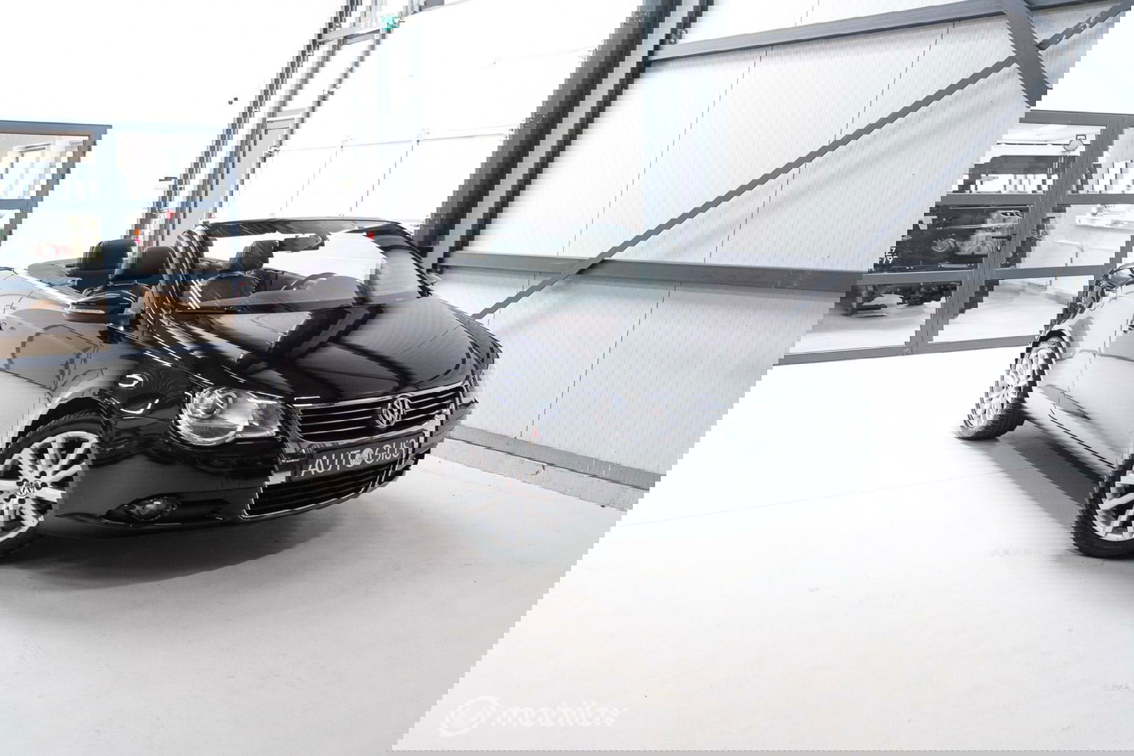 Volkswagen Eos 1.4 TSI Highline | Leder | Glazen schuifdak | Stoelverwarming | Navigatie | PDC | NL auto NAP | Cruise | Clima |