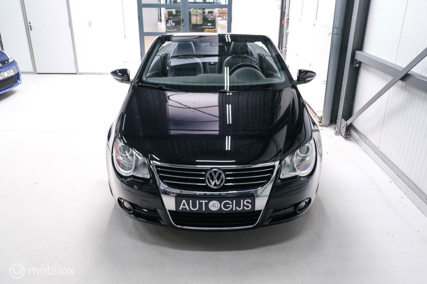 Volkswagen Eos 1.4 TSI Highline | Leder | Glazen schuifdak | Stoelverwarming | Navigatie | PDC | NL auto NAP | Cruise | Clima |