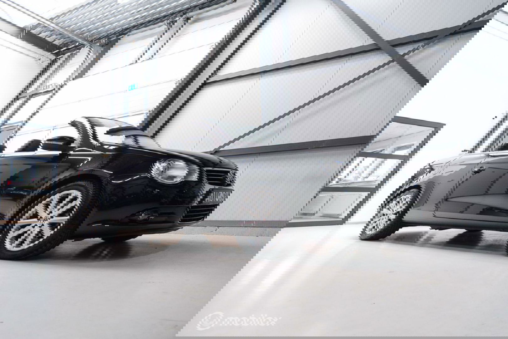 Volkswagen Eos 1.4 TSI Highline | Leder | Glazen schuifdak | Stoelverwarming | Navigatie | PDC | NL auto NAP | Cruise | Clima |