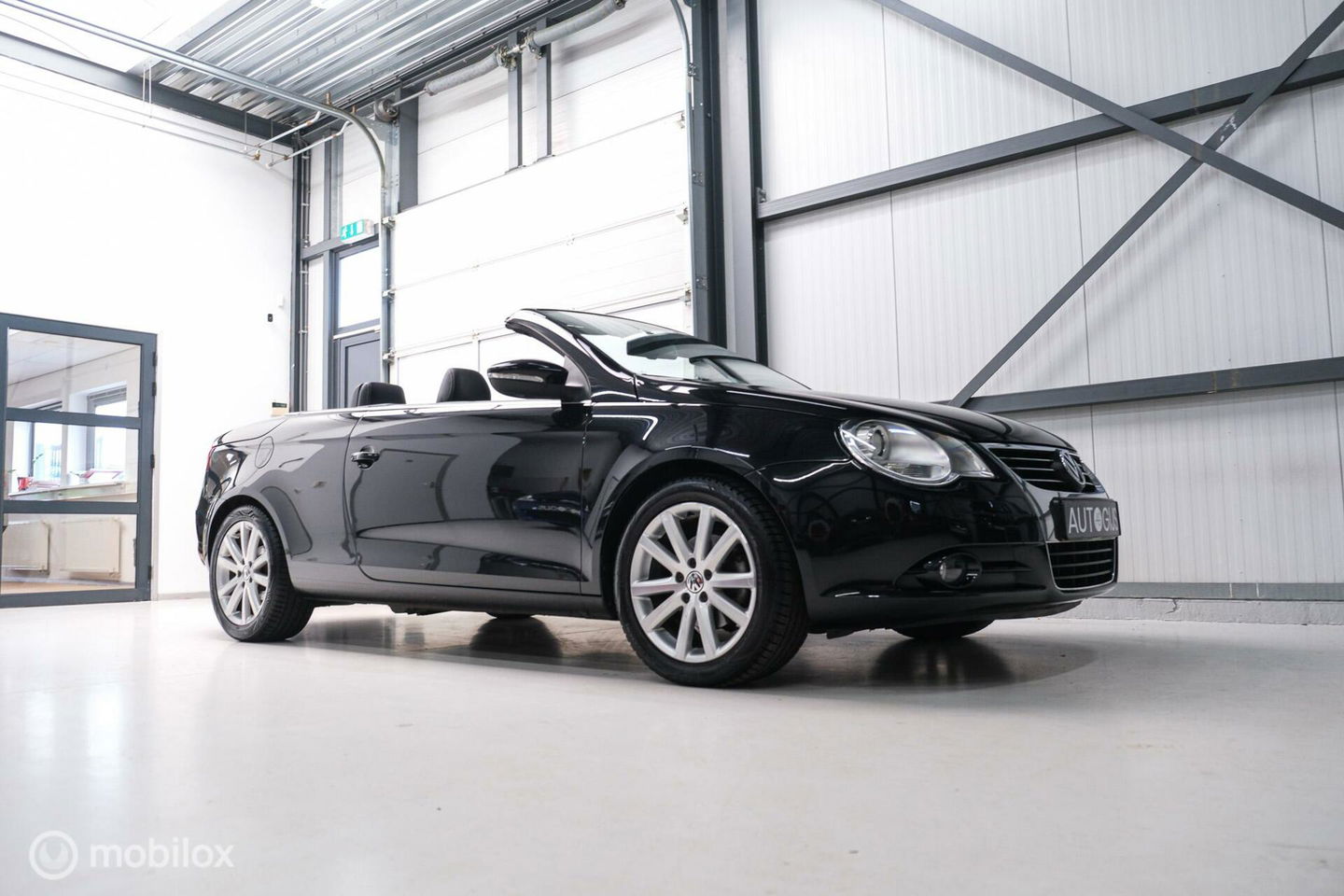 Volkswagen Eos 1.4 TSI Highline | Leder | Glazen schuifdak | Stoelverwarming | Navigatie | PDC | NL auto NAP | Cruise | Clima |
