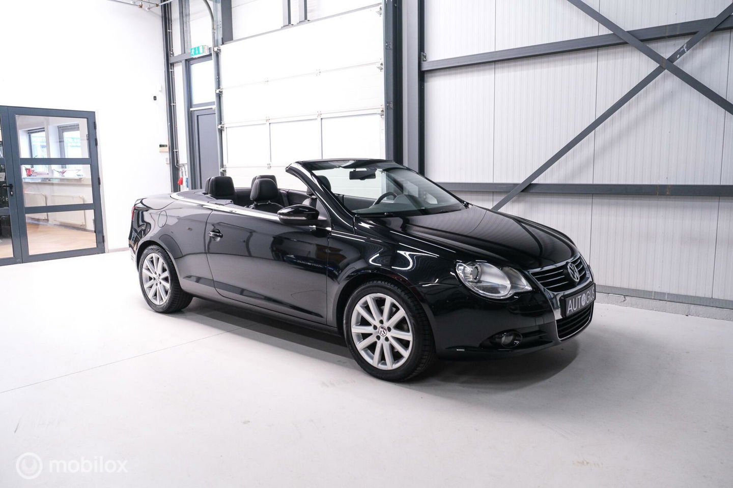 Volkswagen Eos 1.4 TSI Highline | Leder | Glazen schuifdak | Stoelverwarming | Navigatie | PDC | NL auto NAP | Cruise | Clima |