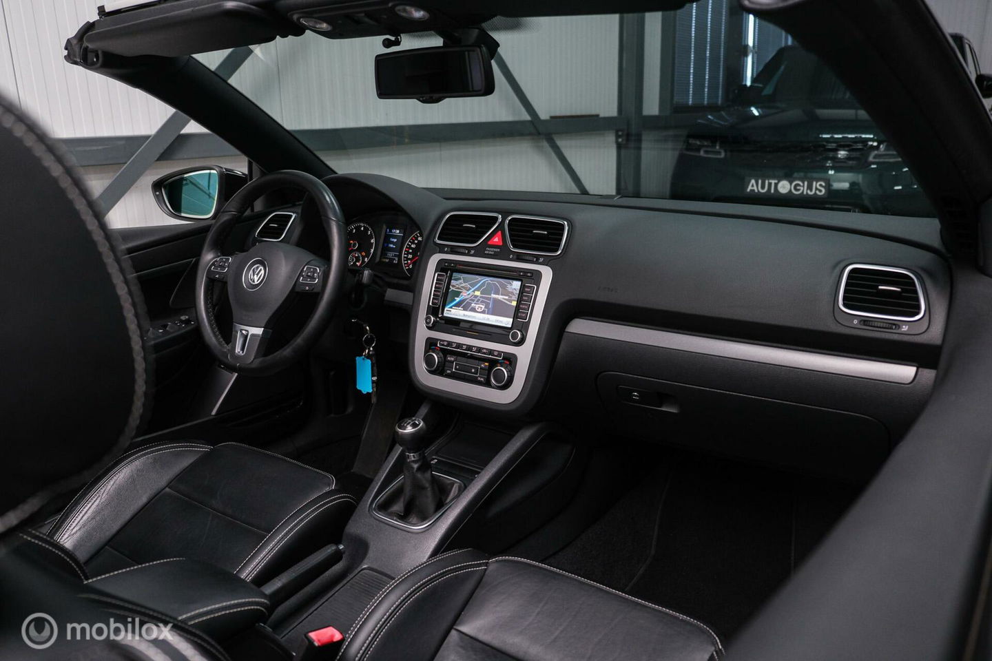 Volkswagen Eos 1.4 TSI Highline | Leder | Glazen schuifdak | Stoelverwarming | Navigatie | PDC | NL auto NAP | Cruise | Clima |