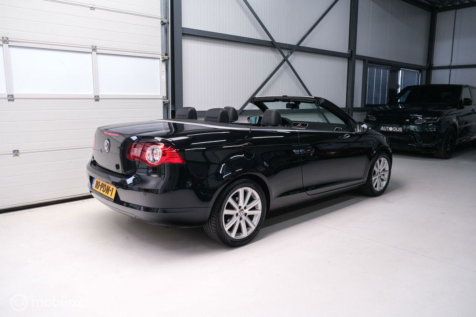 Volkswagen Eos 1.4 TSI Highline | Leder | Glazen schuifdak | Stoelverwarming | Navigatie | PDC | NL auto NAP | Cruise | Clima |