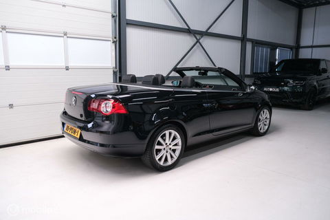 Volkswagen Eos 1.4 TSI Highline | Leder | Glazen schuifdak | Stoelverwarming | Navigatie | PDC | NL auto NAP | Cruise | Clima |