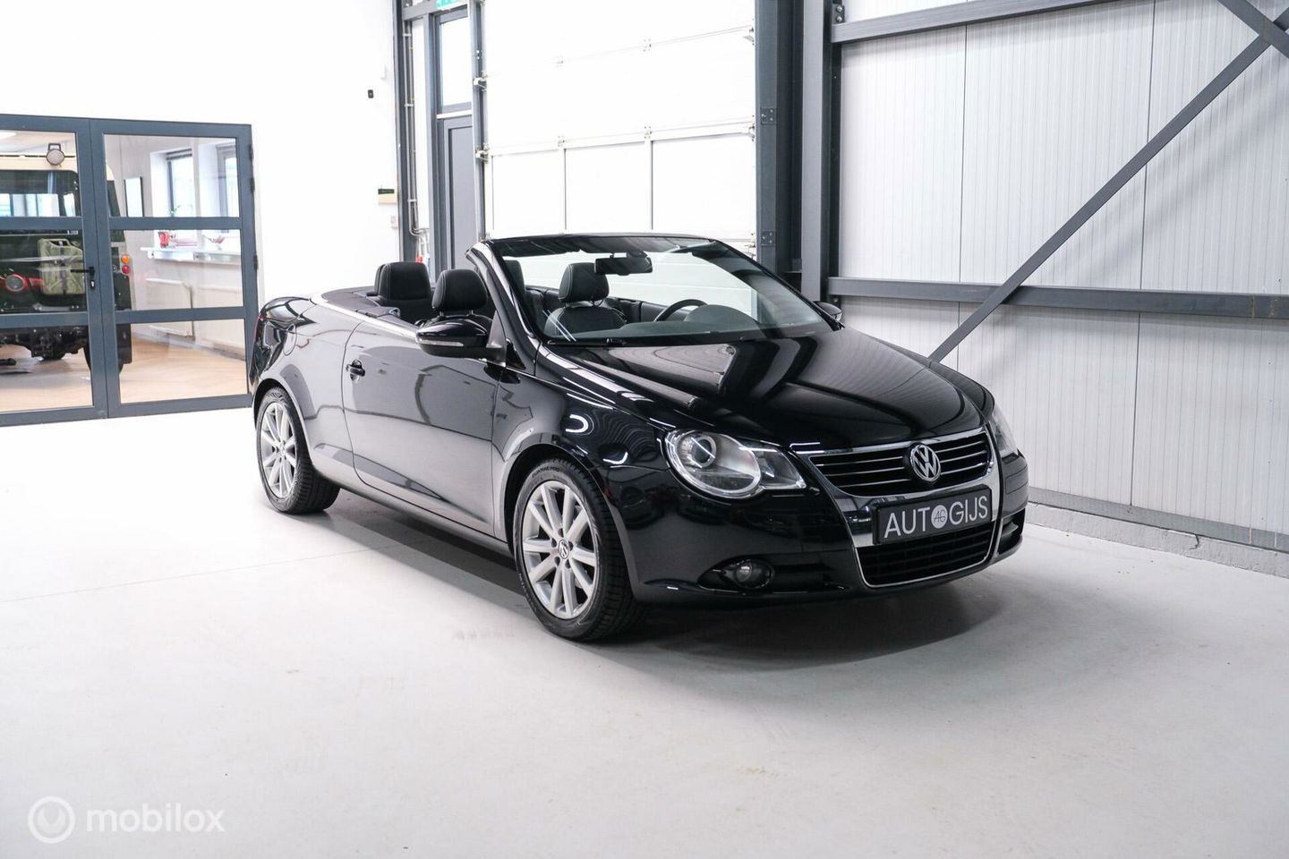 Volkswagen Eos 1.4 TSI Highline | Leder | Glazen schuifdak | Stoelverwarming | Navigatie | PDC | NL auto NAP | Cruise | Clima |