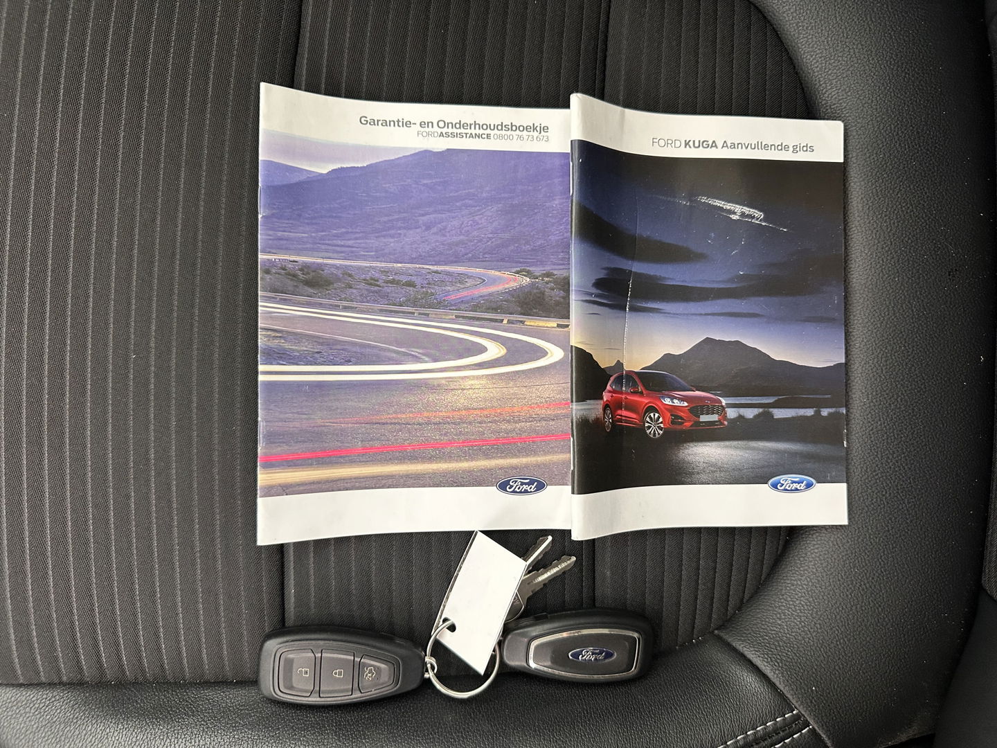 Ford Kuga 2.5 PHEV Titanium X (INCL-BTW) *LEATHER-MICROFIBRE | FULL-LED | DIGI-COCKPIT | ADAPTIVE-CRUISE | BLINDSPOT | PARK-PILOT | CAMERA | NAVI-FULLMAP | HEATED-COMFORT-SEATS | CARPLAY | DAB | LANE-ASSIST | 17"ALU*