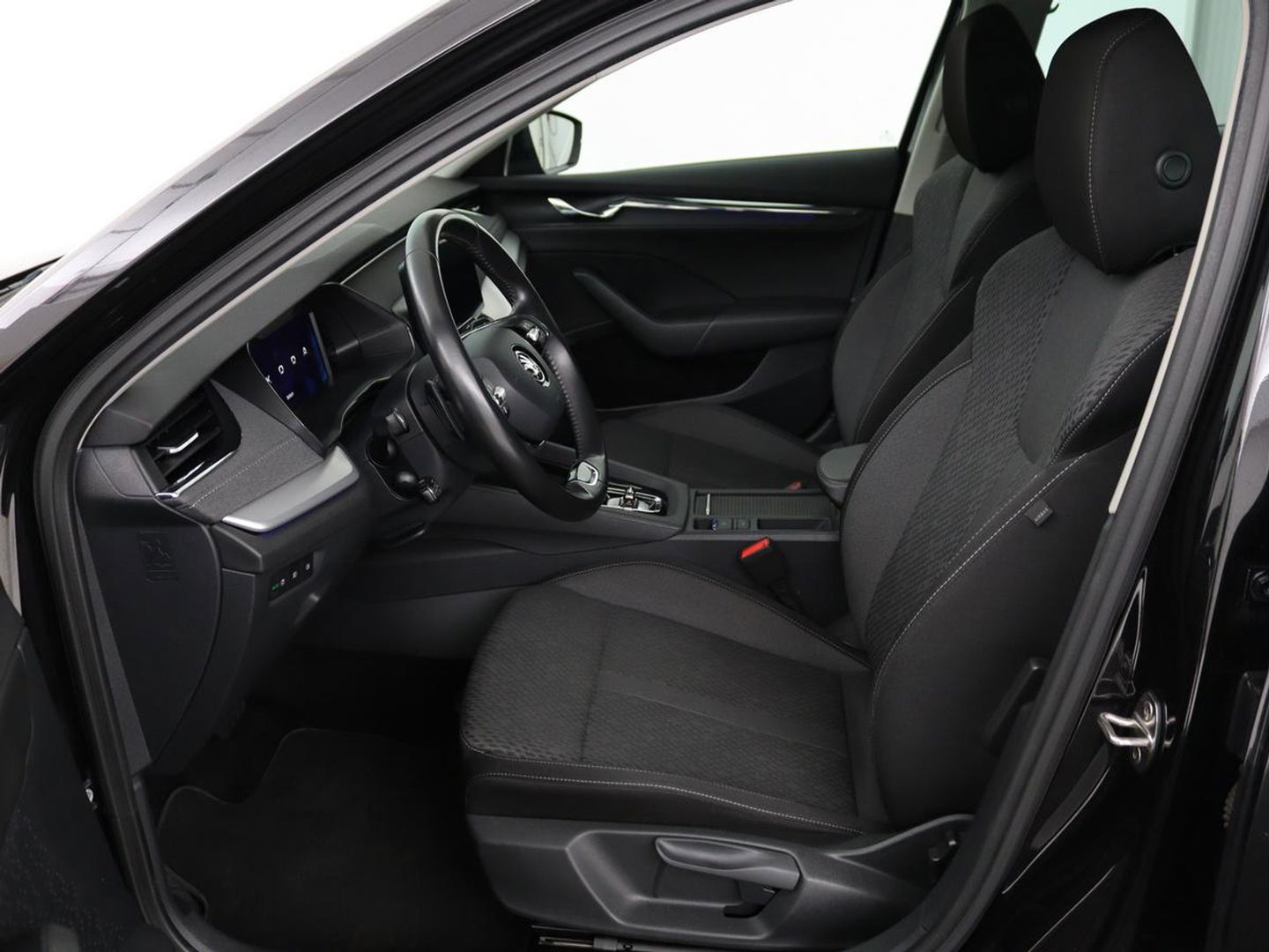 Škoda Octavia Combi 1.0 e-TSI Business Edition Plus | Apple Carplay | Cruise Control Adaptief | Navi | Sfeerverlichting |  Dodehoek Detectie | Stoelverwarming