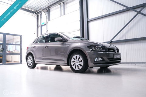 Volkswagen Polo 1.0 TSI Comfortline | Adaptive | NAP NL auto | DAB | All season | Limestone | LED | Navigatie |