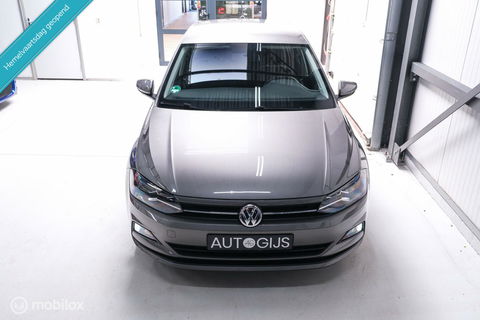 Volkswagen Polo 1.0 TSI Comfortline | Adaptive | NAP NL auto | DAB | All season | Limestone | LED | Navigatie |