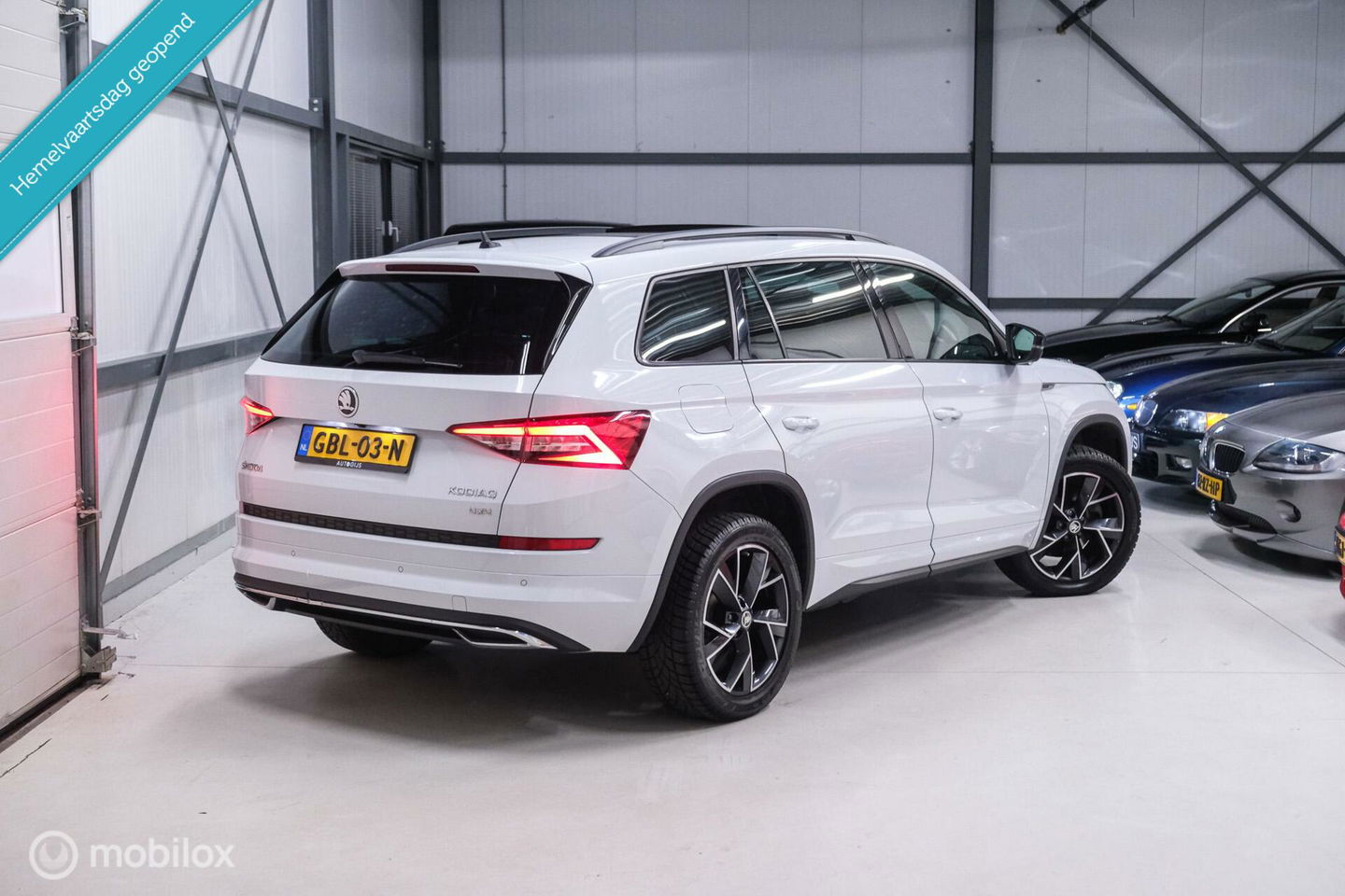 Škoda Kodiaq 2.0 TSI 4x4 Sportline Business 7p. | Panorama | LED | Adaptive | DAB+ | CarPlay | Memory | Keyless |