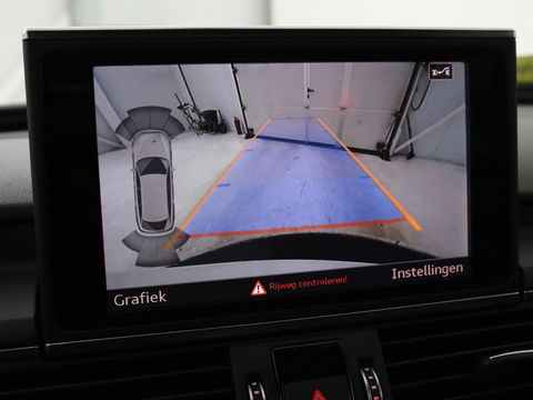 Audi A6 2.0 TFSI quattro S line | Stoelverwarming | Trekhaak | Leder/Alcantara | Camera | Navigatie | Achterbankverwarming | 20'' lichtmetalen velgen | Xenon | Parkeerhulp | Bluetooth