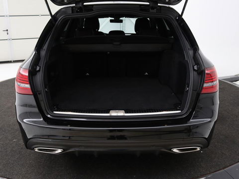 Mercedes-Benz C-Klasse 160 Business Solutions AMG | Stoelverwarming | Trekhaak | Leder/Alcantara | Camera | Navigatie | Park Assist | Full LED | Climate control
