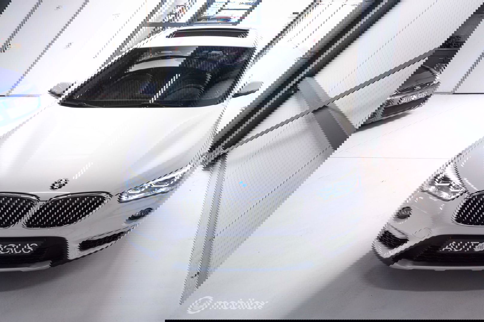 BMW X1 xDrive20i High Executive | 4x4 | HUD | Trekhaak | Leder | Orig NL auto | Dealer onderhouden | Camera | rijklaarprijs |
