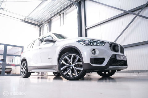 BMW X1 xDrive20i High Executive | 4x4 | HUD | Trekhaak | Leder | Orig NL auto | Dealer onderhouden | Camera | rijklaarprijs |
