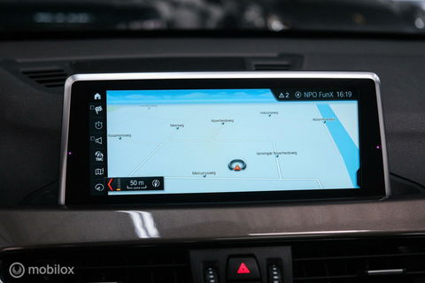 BMW X1 xDrive20i High Executive | 4x4 | HUD | Trekhaak | Leder | Orig NL auto | Dealer onderhouden | Camera | rijklaarprijs |