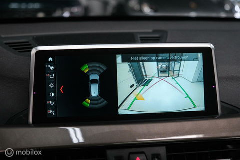 BMW X1 xDrive20i High Executive | 4x4 | HUD | Trekhaak | Leder | Orig NL auto | Dealer onderhouden | Camera | rijklaarprijs |
