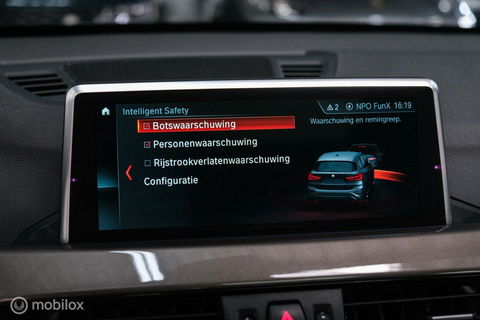 BMW X1 xDrive20i High Executive | 4x4 | HUD | Trekhaak | Leder | Orig NL auto | Dealer onderhouden | Camera | rijklaarprijs |