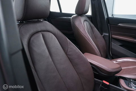 BMW X1 xDrive20i High Executive | 4x4 | HUD | Trekhaak | Leder | Orig NL auto | Dealer onderhouden | Camera | rijklaarprijs |