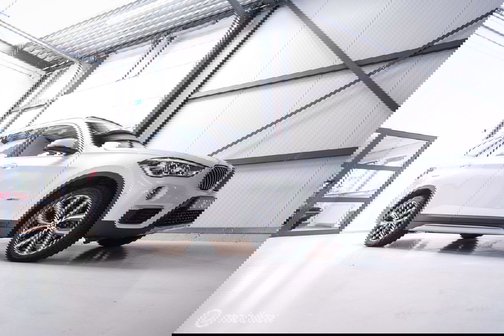 BMW X1 xDrive20i High Executive | 4x4 | HUD | Trekhaak | Leder | Orig NL auto | Dealer onderhouden | Camera | rijklaarprijs |