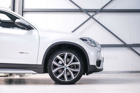 BMW X1 xDrive20i High Executive | 4x4 | HUD | Trekhaak | Leder | Orig NL auto | Dealer onderhouden | Camera | rijklaarprijs |