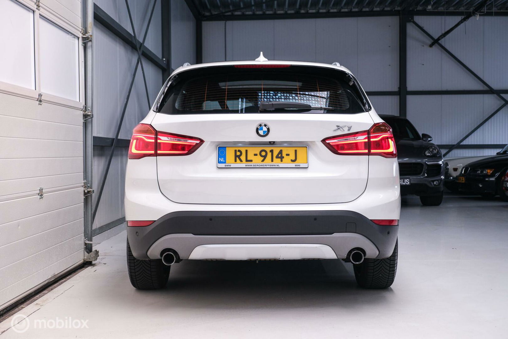 BMW X1 xDrive20i High Executive | 4x4 | HUD | Trekhaak | Leder | Orig NL auto | Dealer onderhouden | Camera | rijklaarprijs |