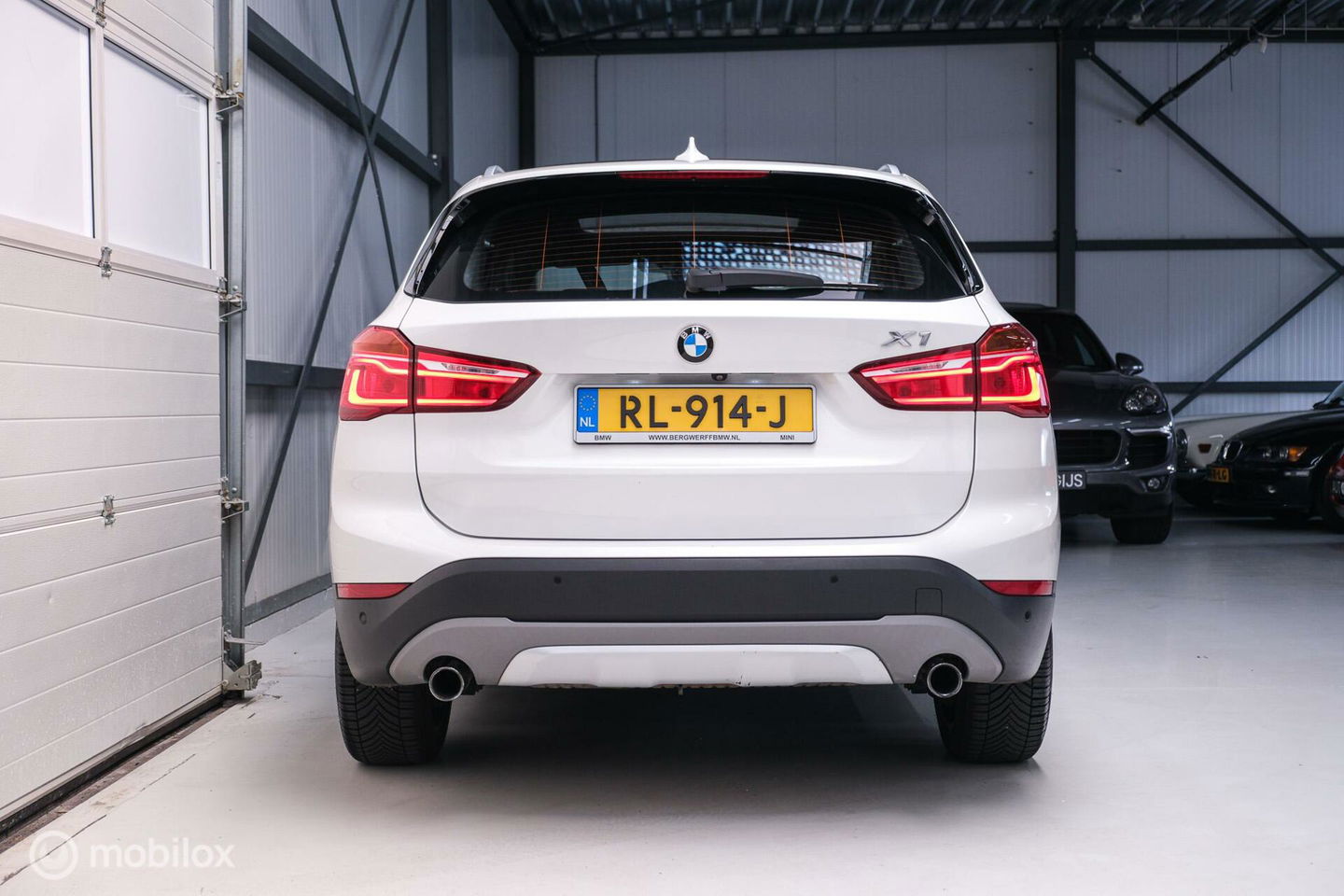 BMW X1 xDrive20i High Executive | 4x4 | HUD | Trekhaak | Leder | Orig NL auto | Dealer onderhouden | Camera | rijklaarprijs |