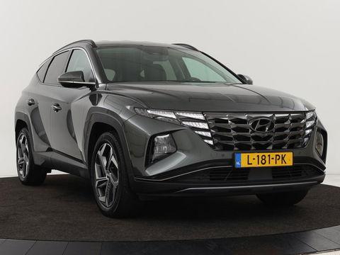 Hyundai Tucson 1.6 T-GDI HEV Premium | Leder | Stoelventilatie | Adaptive cruise | 360 camera | Carplay | Stuurverwarming | Memory | Navigatie | Full LED