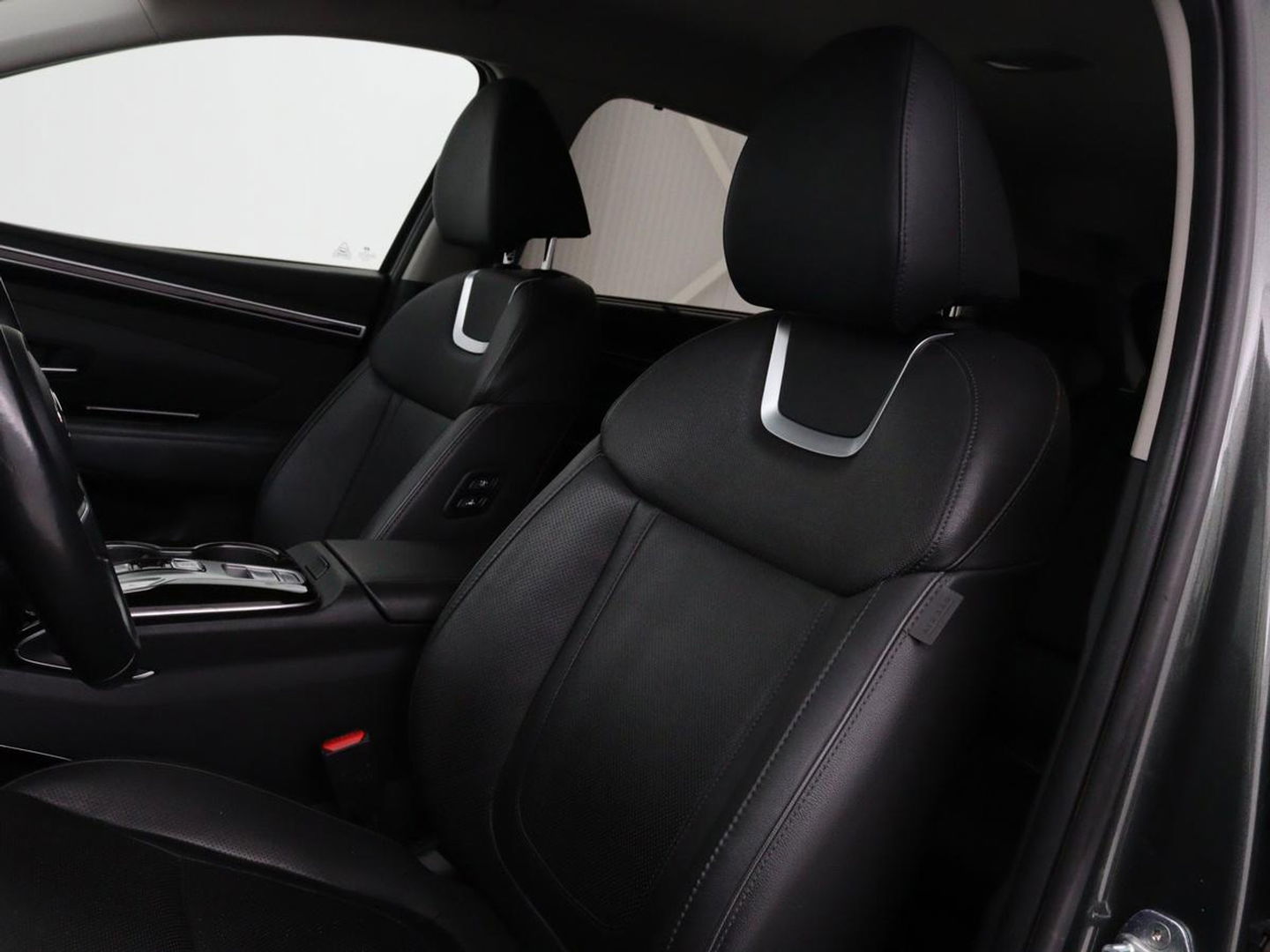Hyundai Tucson 1.6 T-GDI HEV Premium | Leder | Stoelventilatie | Adaptive cruise | 360 camera | Carplay | Stuurverwarming | Memory | Navigatie | Full LED