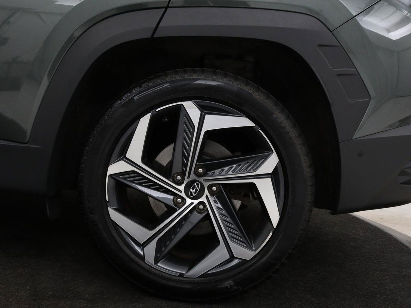 Hyundai Tucson 1.6 T-GDI HEV Premium | Leder | Stoelventilatie | Adaptive cruise | 360 camera | Carplay | Stuurverwarming | Memory | Navigatie | Full LED