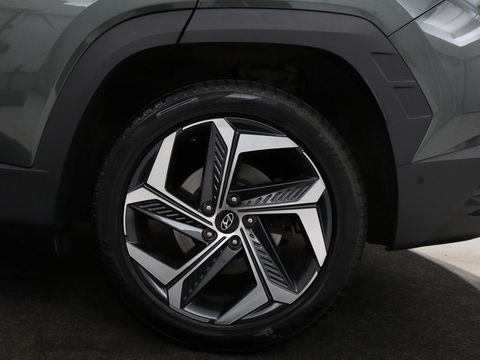 Hyundai Tucson 1.6 T-GDI HEV Premium | Leder | Stoelventilatie | Adaptive cruise | 360 camera | Carplay | Stuurverwarming | Memory | Navigatie | Full LED
